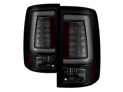 Winjet Sequential LED Tail Lights; Gloss Black Housing; Clear Lens (10-18 RAM 2500 w/ Factory Halogen Tail Lights)